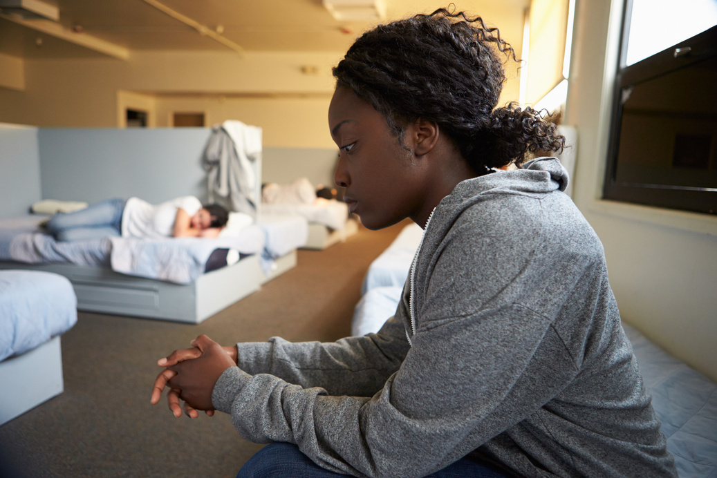 Women Sitting on Beds 