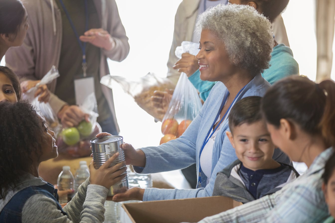 Senior woman volunteering in food bank